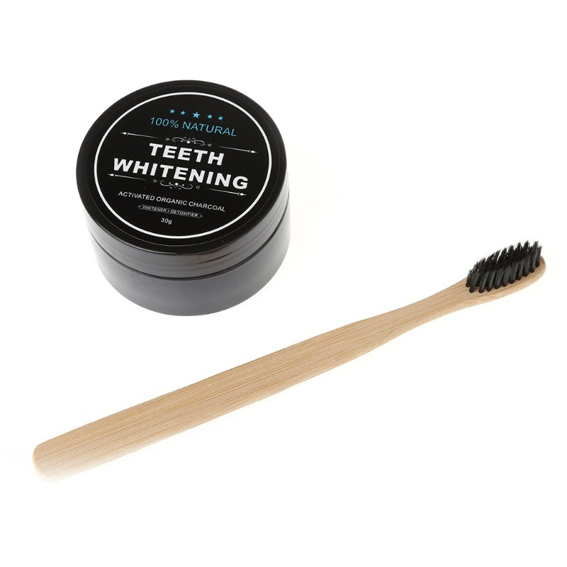 Activated charcoal teeth whitening powder with bamboo toothbrush