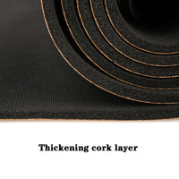 Woman practicing yoga on EcoFlow cork mat