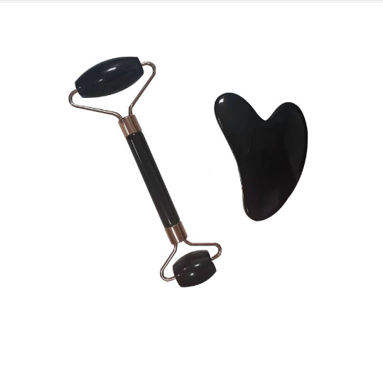 White jade face roller and gua sha - traditional Chinese beauty tools