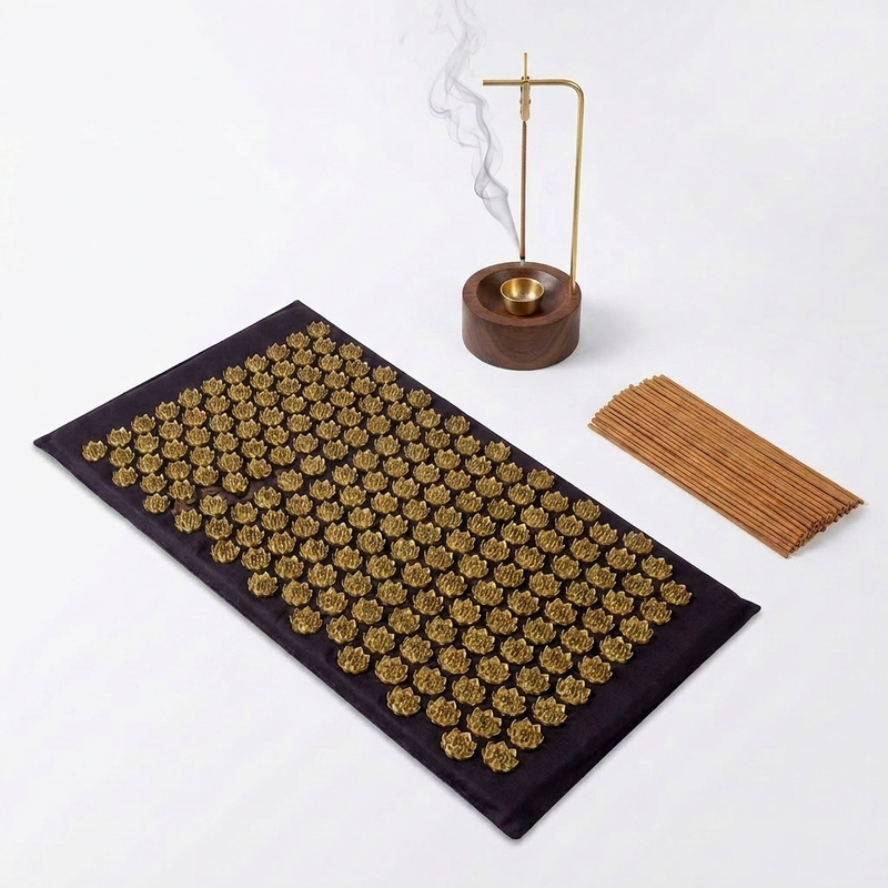 Relaxation and recovery wellness bundle with acupressure mat, sandalwood incense sticks and wooden holder